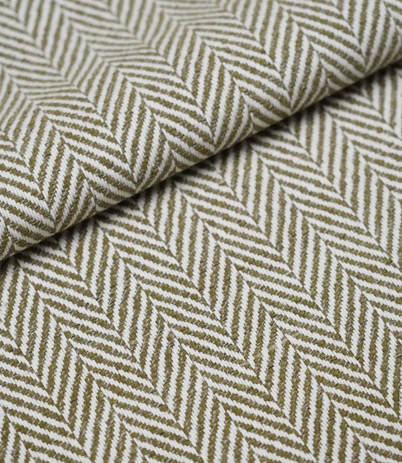 Folded Bampton Matcha woven herringbone fabric showing its soft texture and classic chevron design.