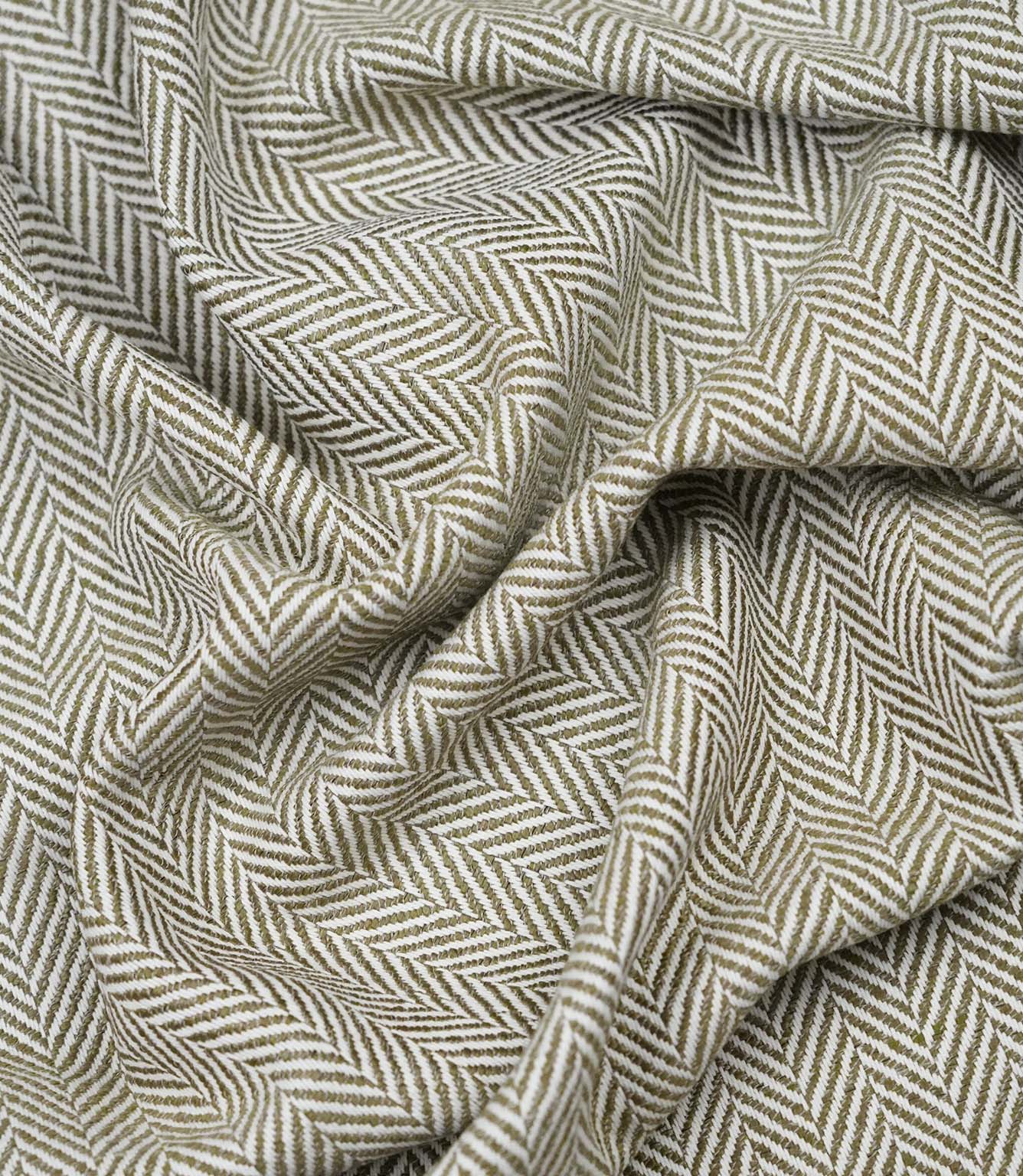 Draped Bampton Matcha woven herringbone fabric demonstrating its soft handle and elegant drape, suitable for curtains, blinds and cushions.
