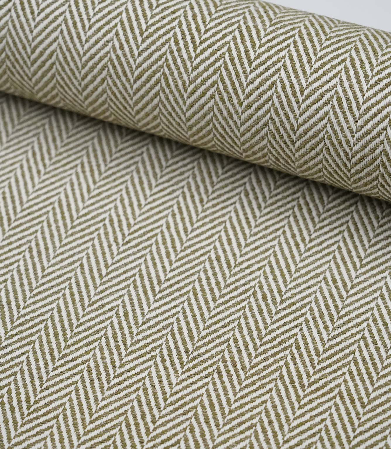 Wide view of Bampton Matcha woven herringbone fabric showcasing the continuous chevron pattern across the fabric width.