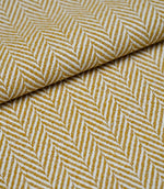 Folded Bampton Turmeric woven herringbone fabric showing the soft texture, fabric weight and classic chevron design.