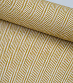 Wide view of Bampton Turmeric woven herringbone fabric showcasing the continuous chevron pattern across the fabric width.