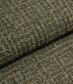 Folded Bellmere Forest upholstery fabric showing the depth, texture and durability of the woven boucle surface.
