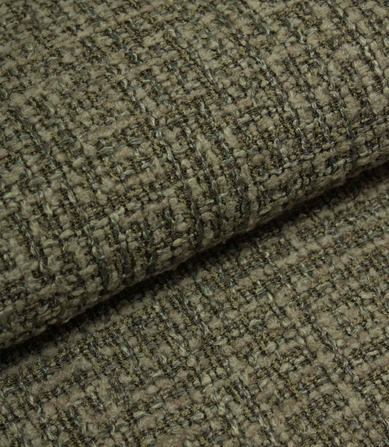 Folded Bellmere Forest upholstery fabric showing the depth, texture and durability of the woven boucle surface.