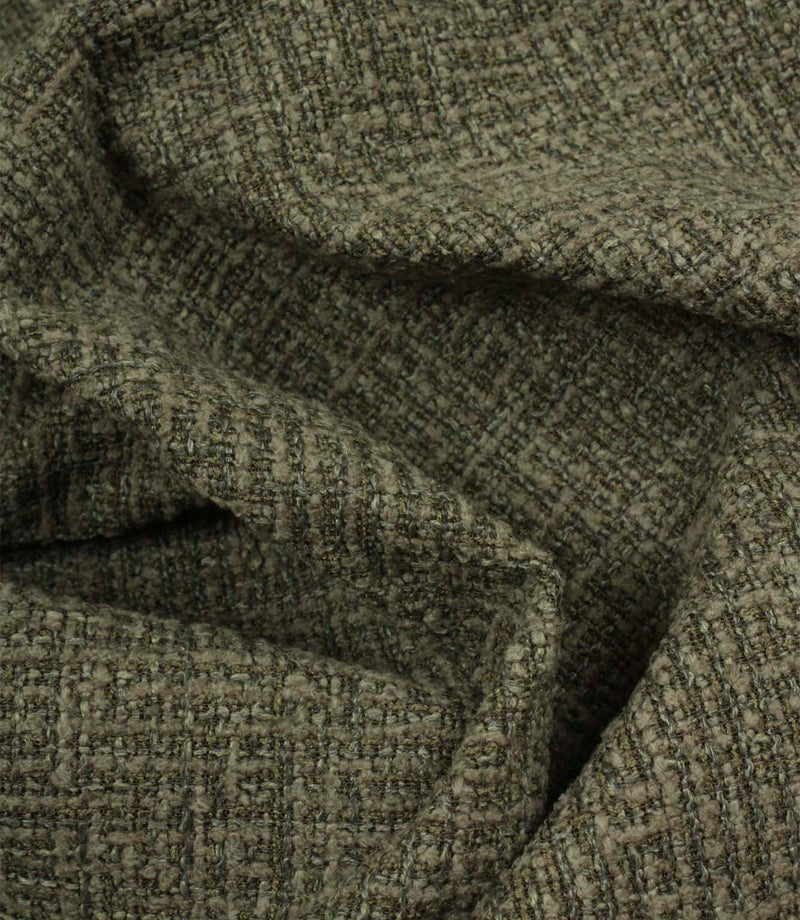 Bellmere Forest textured upholstery fabric draped to demonstrate its soft handle and structured woven finish.