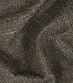 Bellmere Slate textured upholstery fabric draped naturally to demonstrate its soft handle, structure and dimensional woven finish.