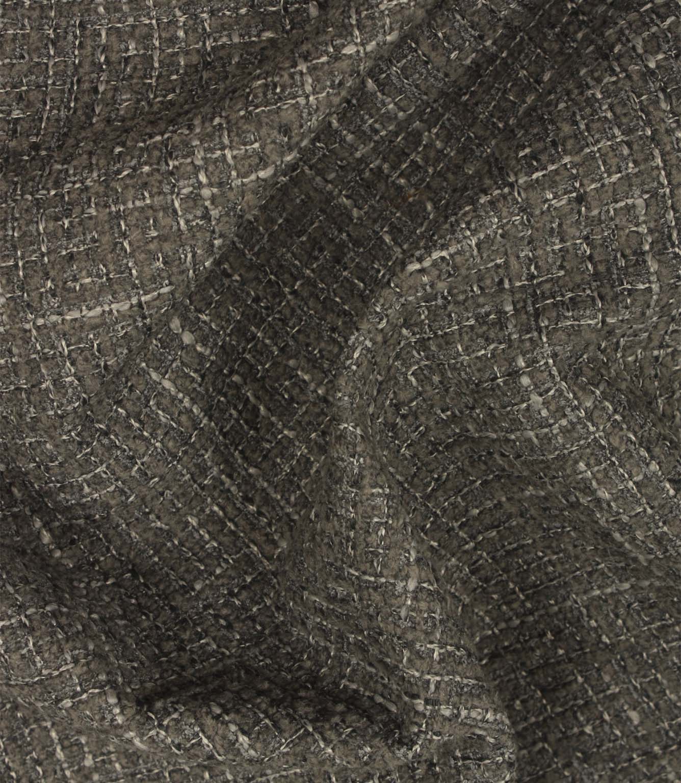 Bellmere Slate textured upholstery fabric draped naturally to demonstrate its soft handle, structure and dimensional woven finish.