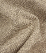 Bellmere Stone textured upholstery fabric draped naturally to demonstrate its soft handle, structured appearance and versatile woven finish.
