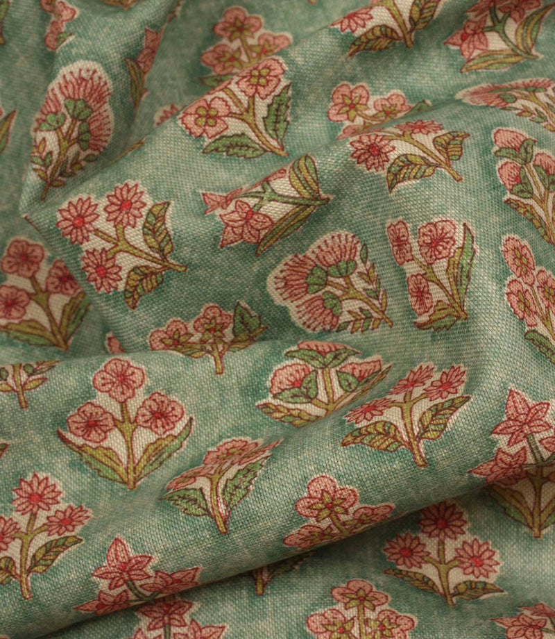 Draped floral fabric with repeating hand-drawn style blooms and a relaxed natural finish.