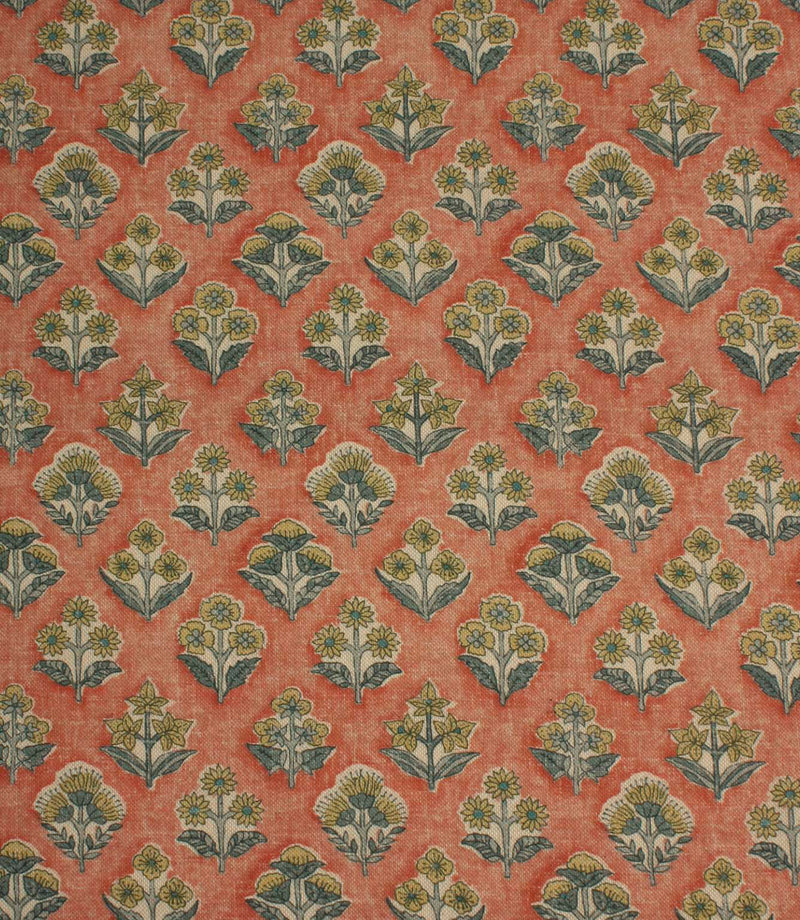 Boho Blossom ditsy floral fabric featuring small-scale botanical motifs in soft mustard yellow and slate blue on a warm terracotta background.