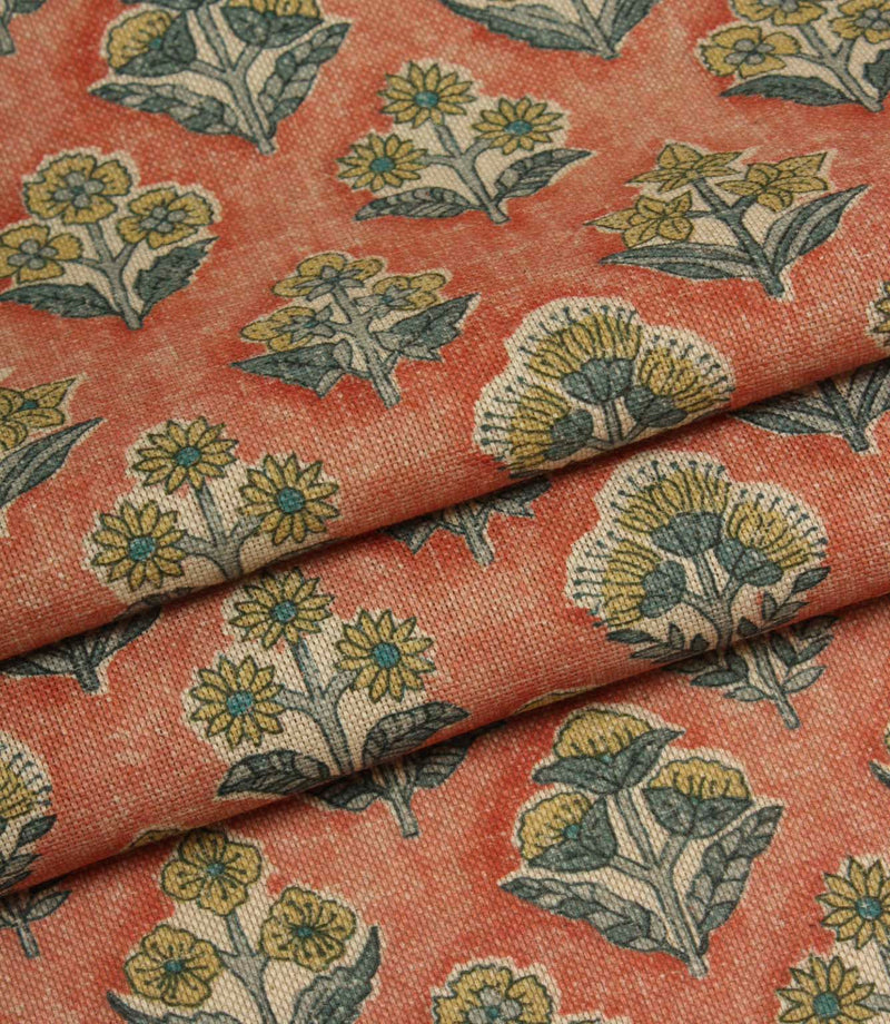 Folded Boho Blossom small-scale floral fabric highlighting the textured terracotta background and delicate botanical print.
