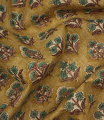 Draped Boho Blossom floral fabric with teal and brown floral motifs across a textured mustard yellow woven surface.