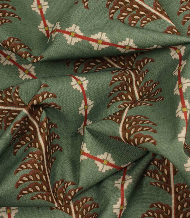 Boho Trail Mineral printed fabric draped to demonstrate its handle and decorative botanical design for interior furnishings and soft furnishings.