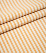 Broadway Stripe Sunflower fabric arranged in three neat overlapping folds, displaying the repeating sunflower orange and off-white striped design and textured weave across both flat and gently curved surfaces.