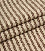 Folded Broadway Stripe Mocha woven fabric displaying classic brown and cream ticking-style stripes, suitable for upholstery, curtains and cushions.