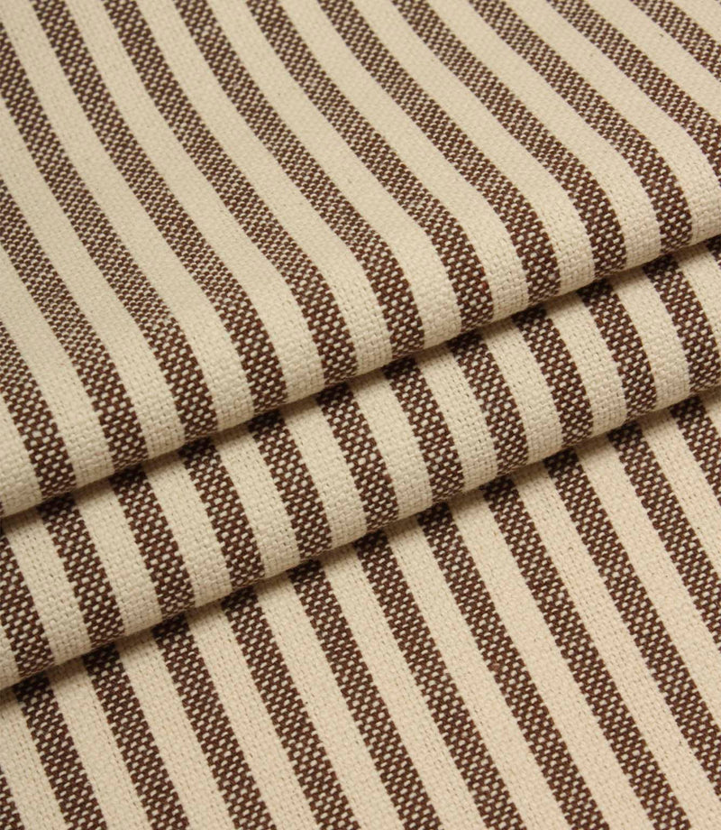 Folded Broadway Stripe Mocha woven fabric displaying classic brown and cream ticking-style stripes, suitable for upholstery, curtains and cushions.