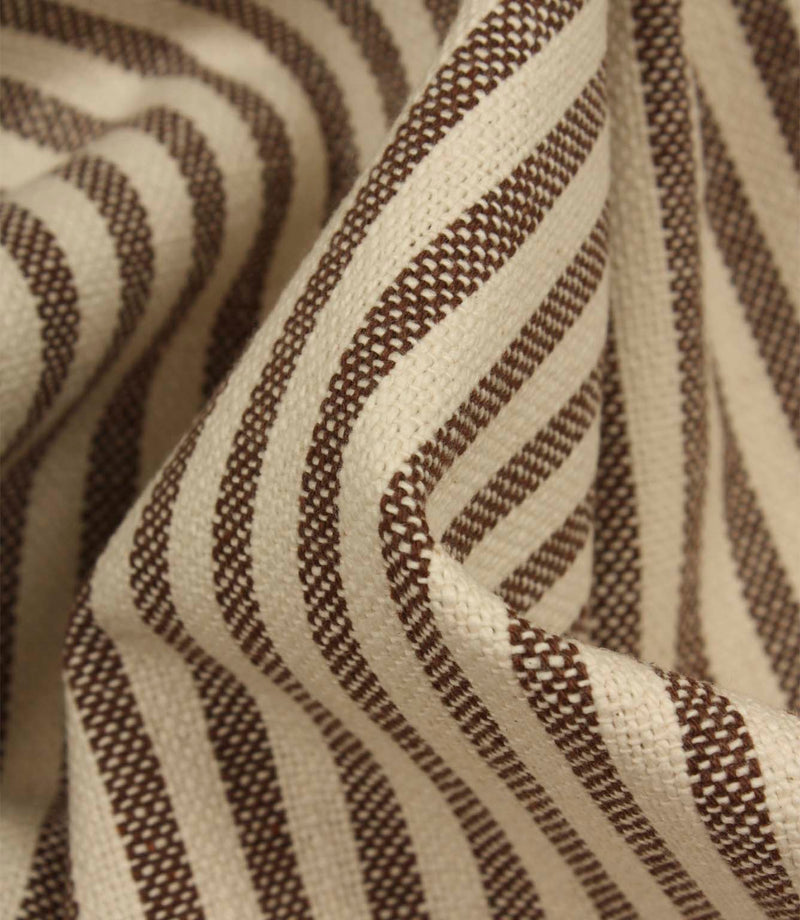 Detailed close-up of Broadway Stripe Mocha upholstery fabric featuring finely woven mocha brown stripes and a durable textured weave for interior projects.