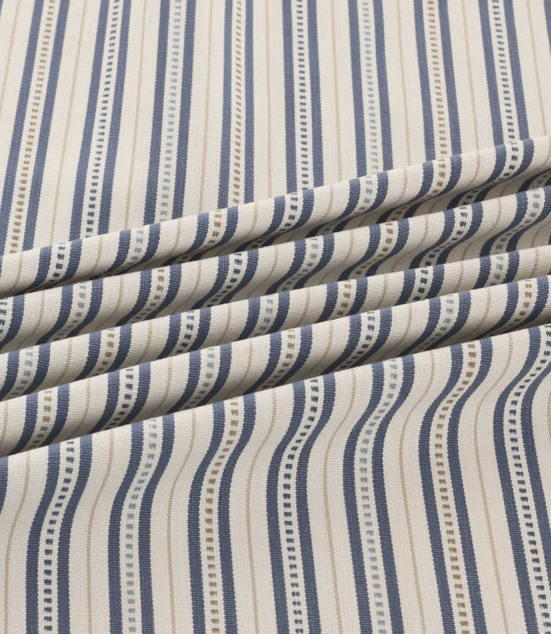 Brookhaven Nautica striped fabric arranged in soft folds, showcasing navy and slate blue vertical stripes, fine decorative dotted lines and woven-look texture.
