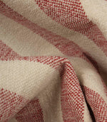 Detailed close-up of Burleigh Stripe Rose upholstery fire retardant fabric featuring rose pink woven stripes and a textured velvet-look finish.