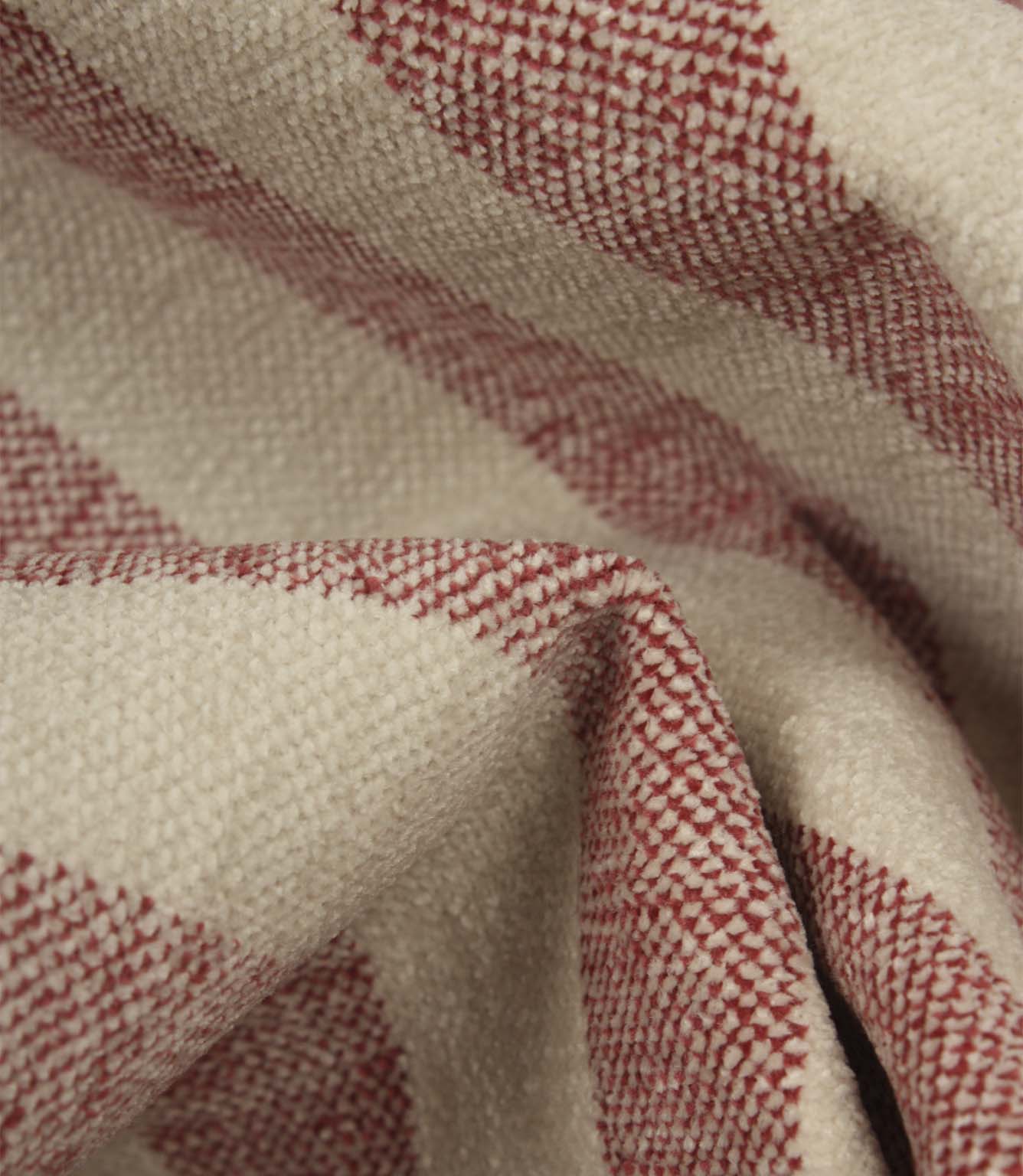 Detailed close-up of Burleigh Stripe Rose upholstery fire retardant fabric featuring rose pink woven stripes and a textured velvet-look finish.