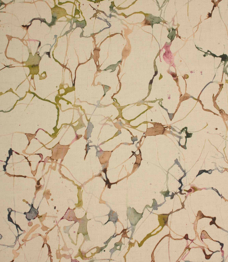 Carrara cotton linen fabric featuring an abstract contemporary design in green, pink, blue and neutral tones.