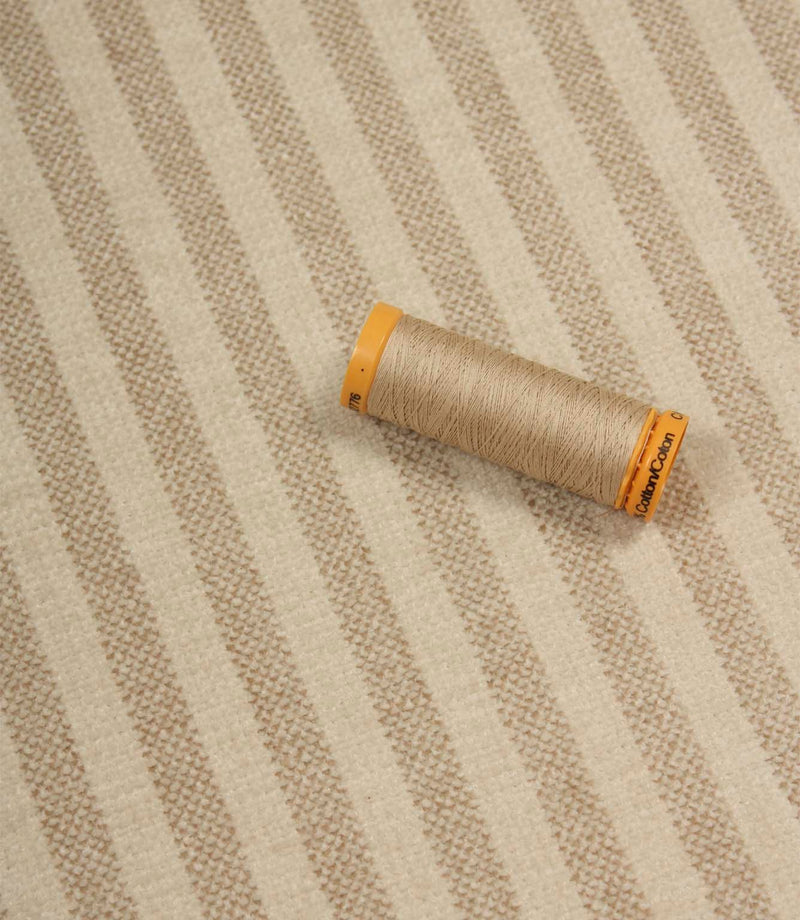 Cavendish Stripe Pebble upholstery fabric with coordinating pebble beige thread, highlighting the detailed stripe weave and upholstery fire retardant construction.