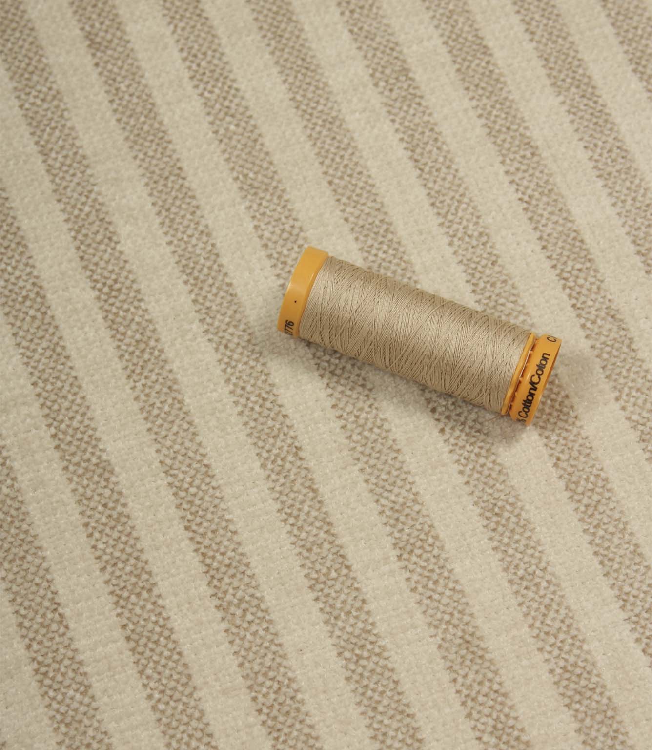Cavendish Stripe Pebble upholstery fabric with coordinating pebble beige thread, highlighting the detailed stripe weave and upholstery fire retardant construction.