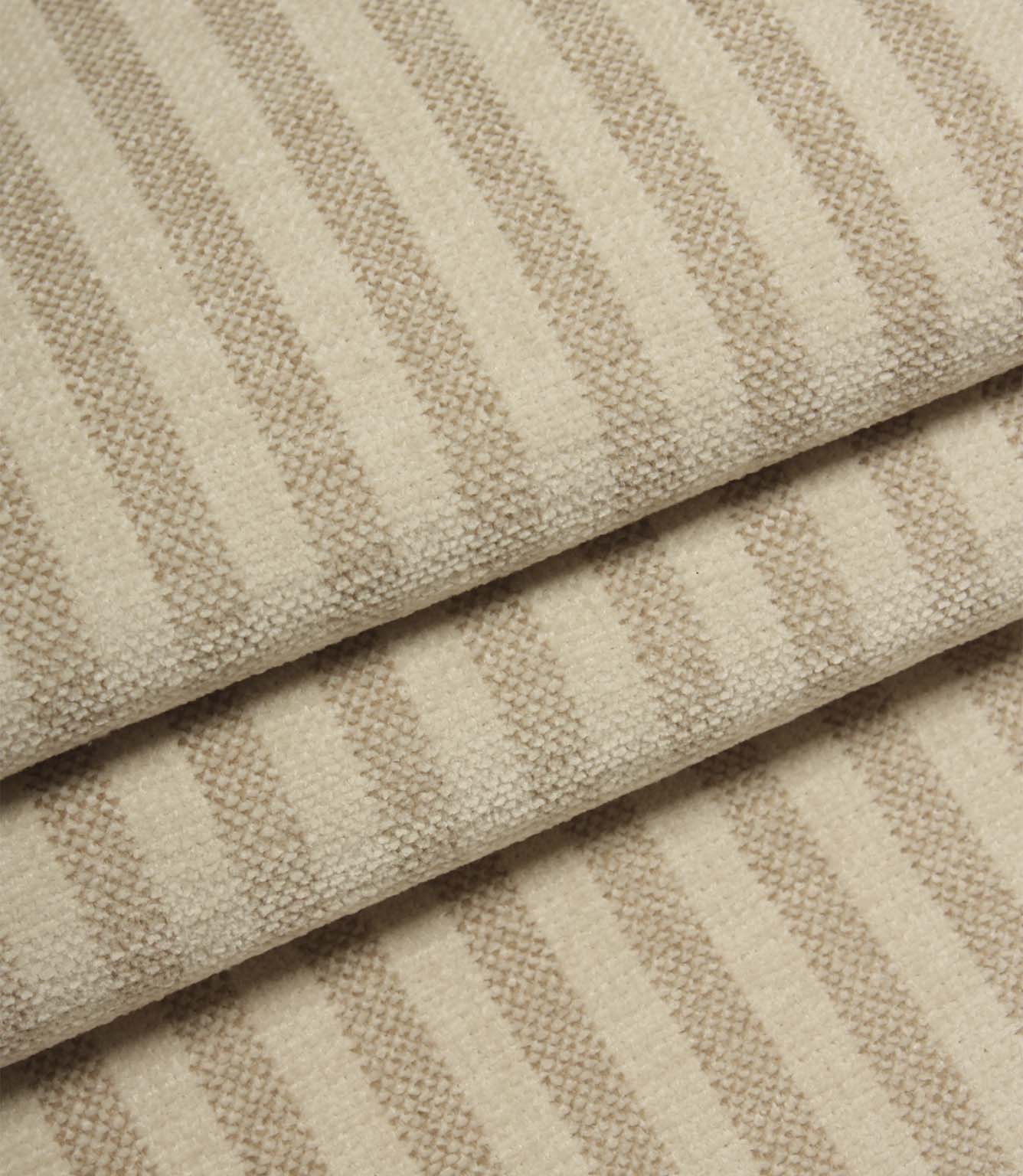 Folded Cavendish Stripe Pebble fire retardant upholstery fabric displaying elegant pebble beige stripes and durable woven texture.