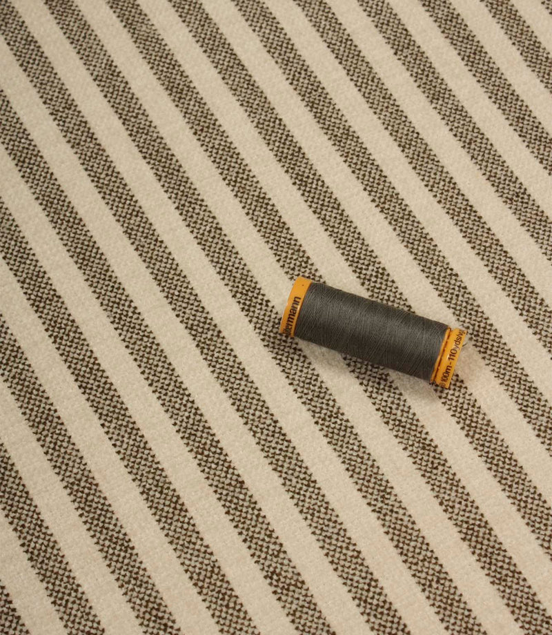 Cavendish Stripe Slate upholstery fire retardant fabric with coordinating slate grey thread, highlighting the fine stripe pattern and durable woven construction.