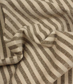 Draped Cavendish Stripe Slate upholstery fire retardant fabric featuring classic slate grey stripes with a soft handle and relaxed natural movement.