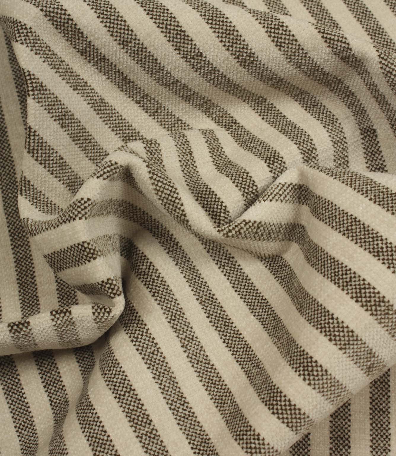 Draped Cavendish Stripe Slate upholstery fire retardant fabric featuring classic slate grey stripes with a soft handle and relaxed natural movement.