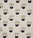 Christmas Pudding Neutral fabric featuring repeating festive Christmas puddings decorated with green holly, red berries and playful mice on a warm neutral background.