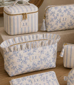 Blue ditsy floral and stripe fabric  makeup bags and pouches