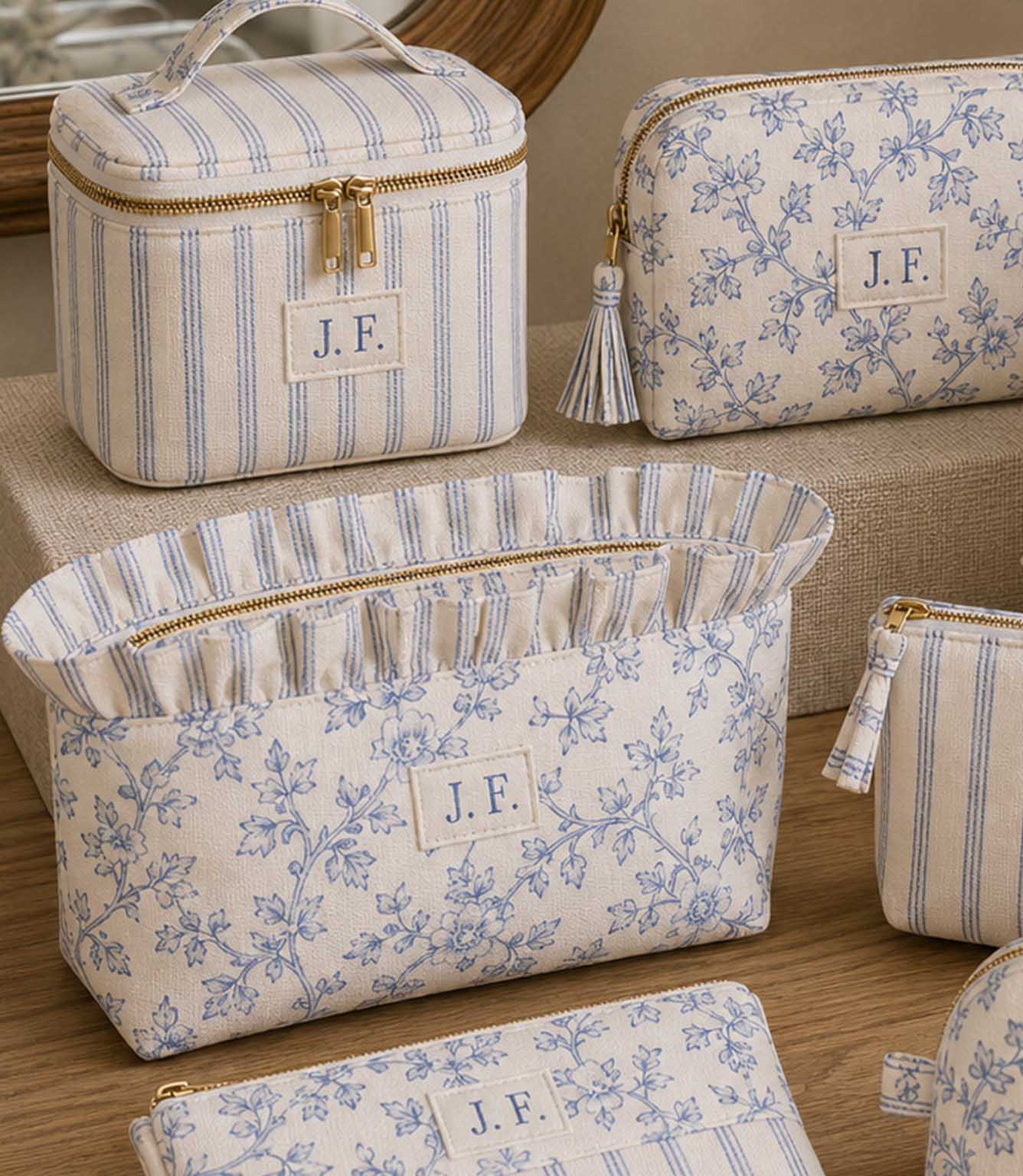 Blue ditsy floral and stripe fabric  makeup bags and pouches