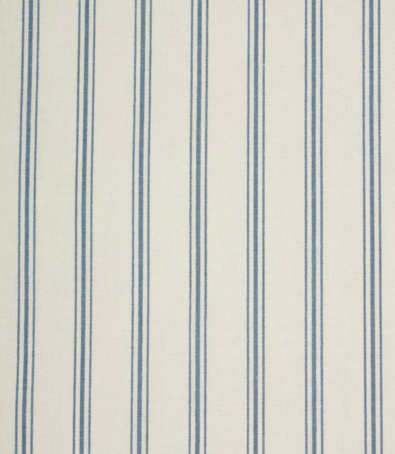 Blue ticking stripe fabric with narrow vertical stripes on a soft ivory background in a classic country-inspired design.