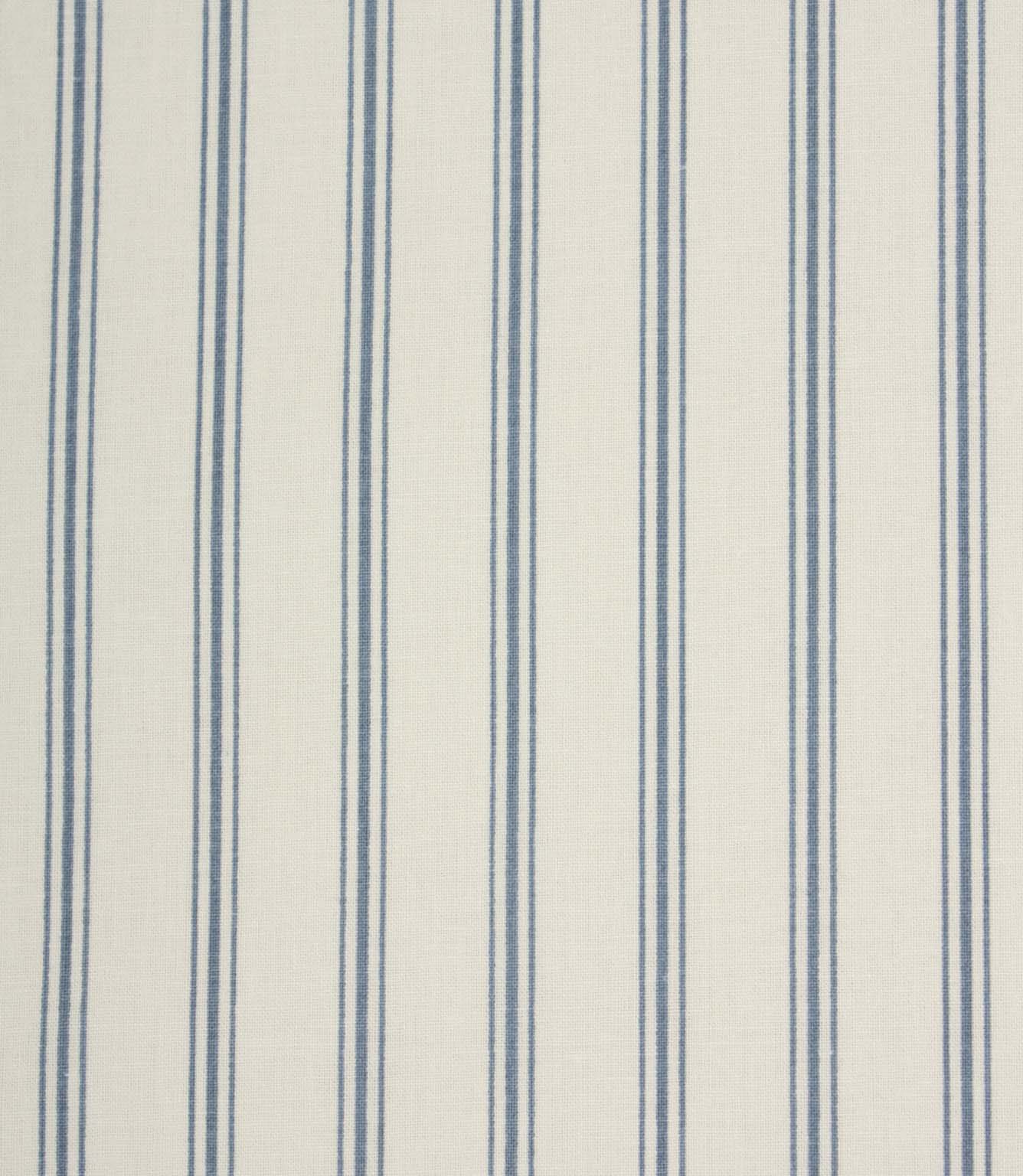 Blue ticking stripe fabric with narrow vertical stripes on a soft ivory background in a classic country-inspired design.