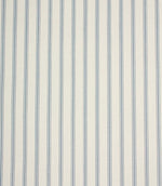Repeating blue stripe upholstery fabric featuring fine vertical ticking stripes on a warm neutral woven base.