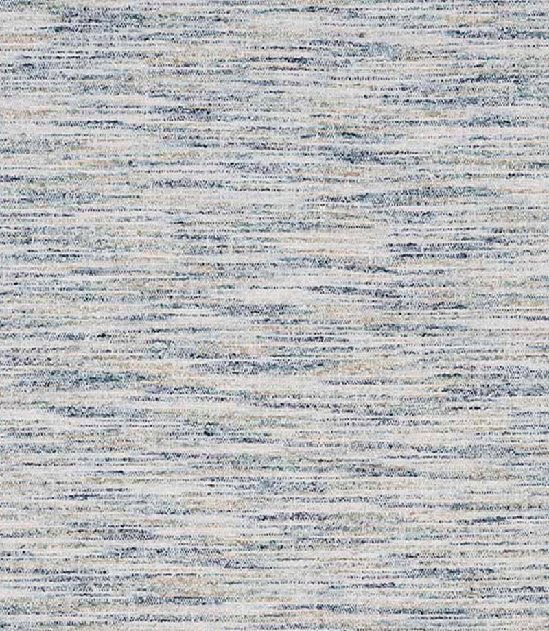 Close-up of woven upholstery fabric in soft neutral tones with subtle blue flecks and a horizontal textured weave.