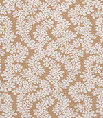 Close-up of woven foliage fabric with a soft leaf pattern in warm caramel brown and off-white tones, showing a natural textured finish.