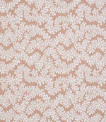 Close-up of woven foliage fabric featuring an intricate leaf pattern in warm terracotta and soft cream tones with a natural textured finish.