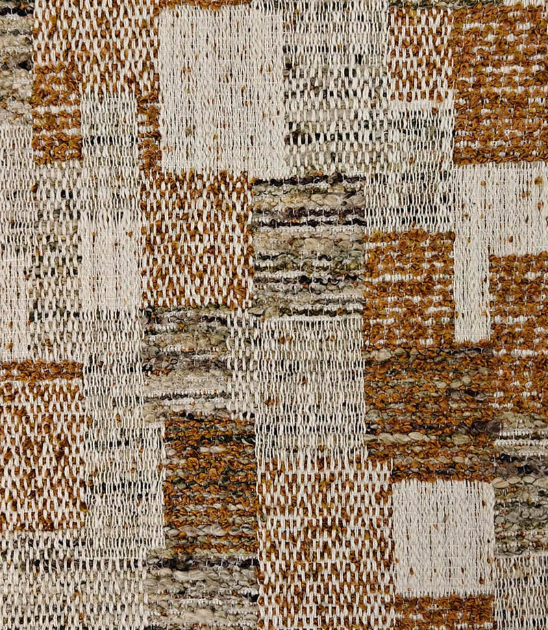 Close-up of Terrana woven geometric fabric featuring small-scale checks in warm rust, natural cream, and soft taupe tones with a textured finish.
