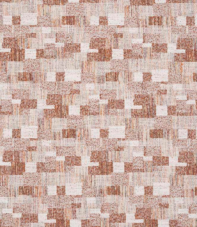 Close-up of woven geometric fabric featuring an abstract check pattern in warm rust, soft beige and cream tones, with a textured, layered weave.