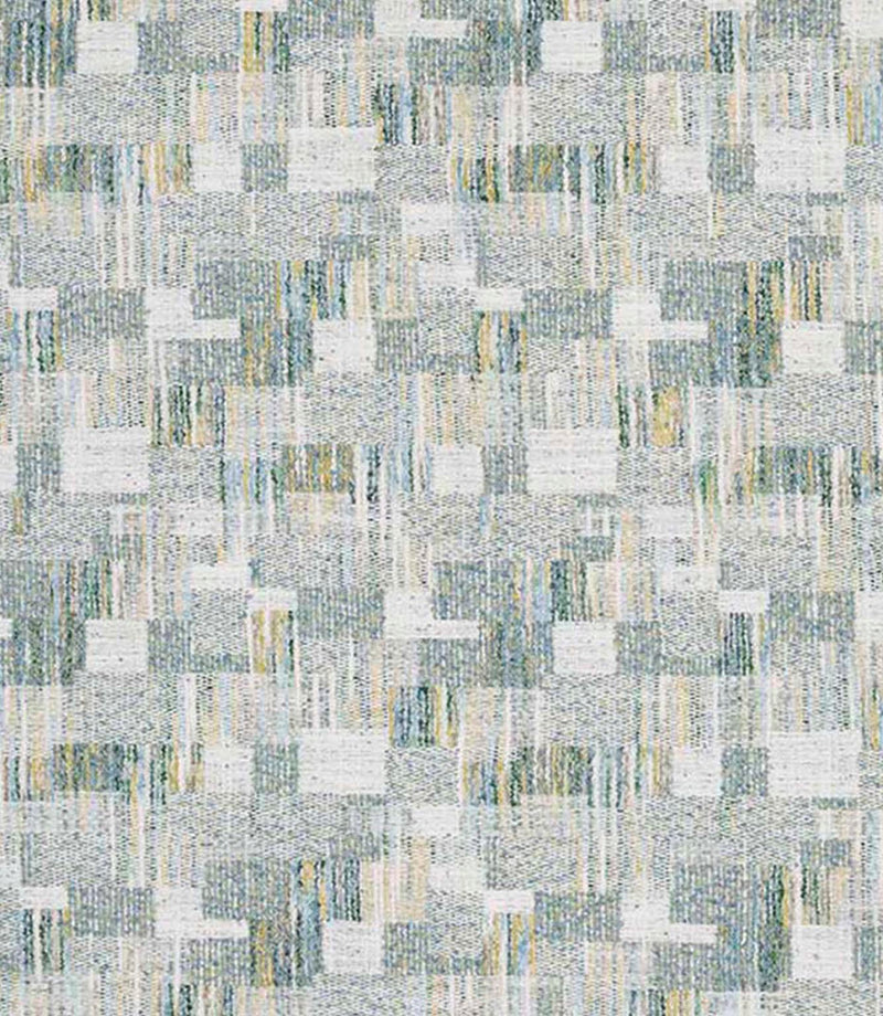 Close-up of woven geometric fabric with an abstract check pattern in soft sage green, pale blue and warm neutral tones, featuring a textured, layered weave.