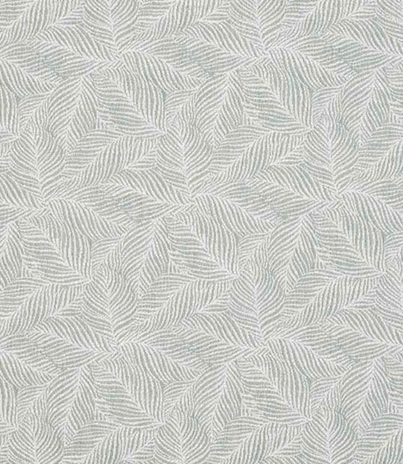 Close-up of woven foliage fabric with a soft sage green and ivory leaf pattern, featuring a finely textured, repeating design.