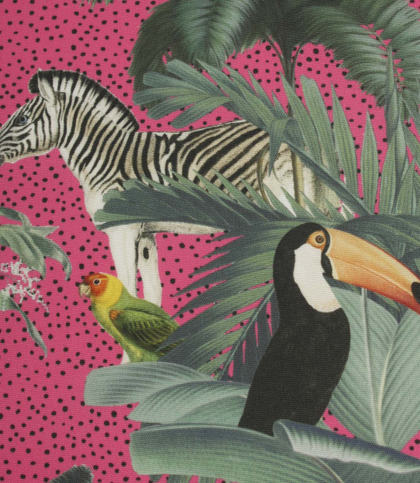 Detailed jungle print fabric with a zebra, toucan and tropical foliage set against a bright pink dotted backdrop.