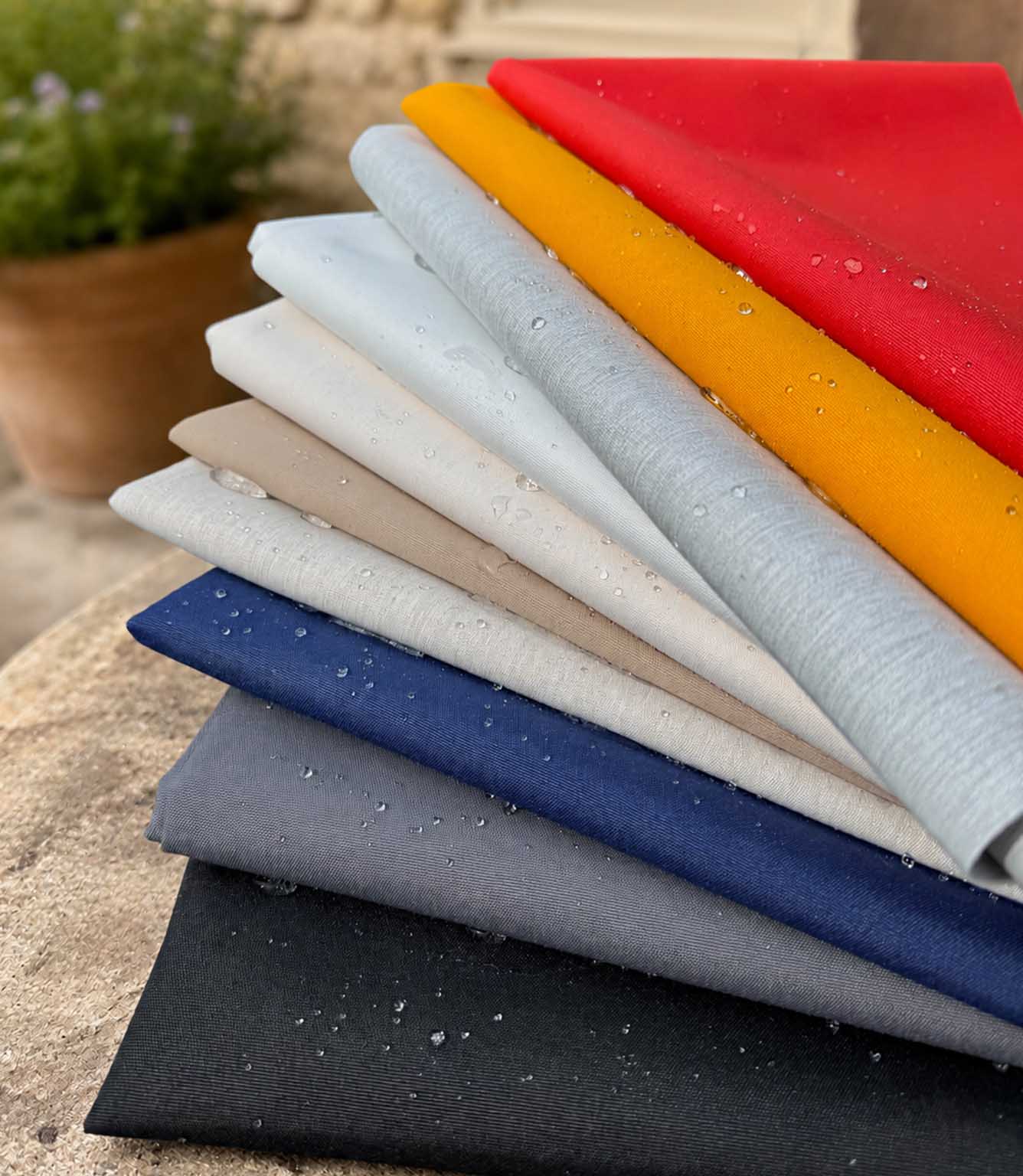 Waterproof fabric outdoor fabric in an array of neutral and vibrant colours