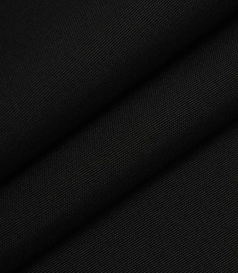 Black woven fabric folded to show structure, weight, and smooth surface finish.