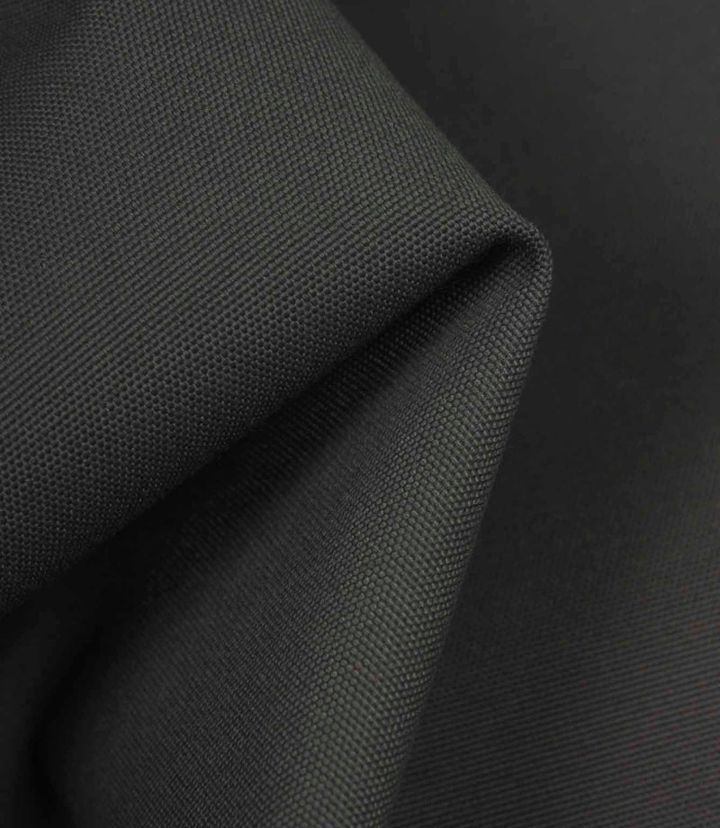 Charcoal grey fabric draped to show body, durability, and gentle surface texture in the light.