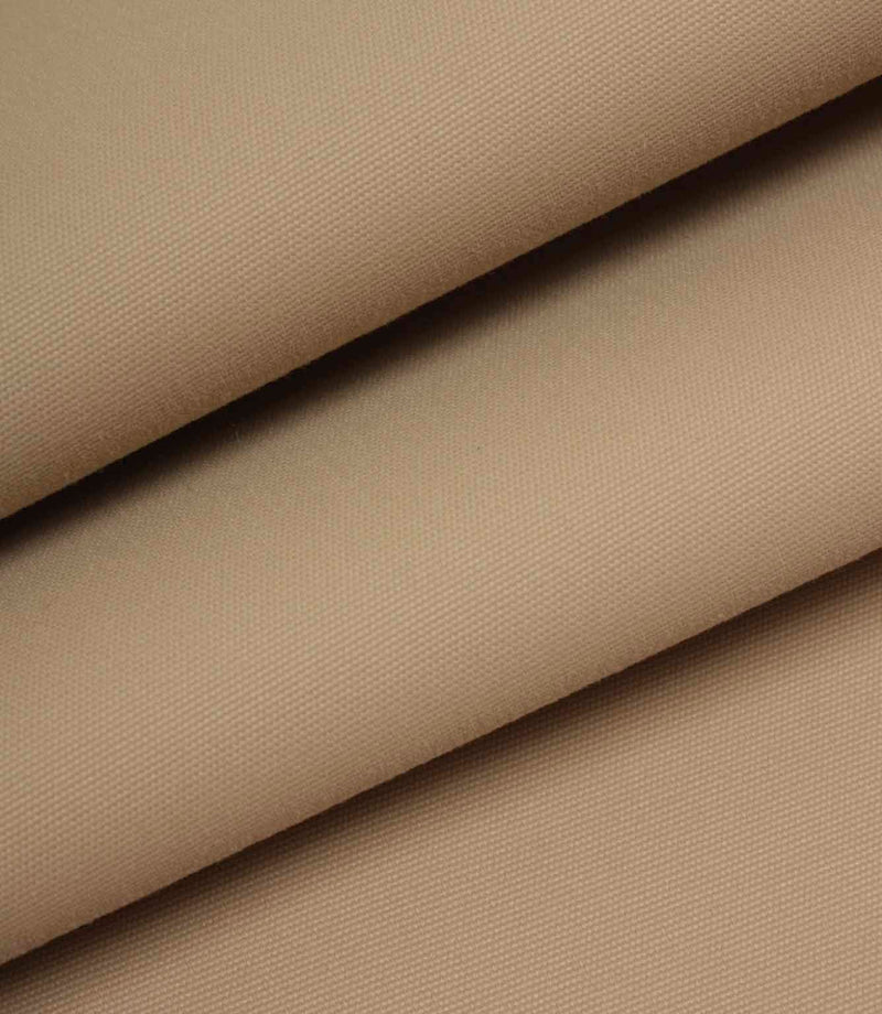 Beige woven fabric folded to show structure, weight, and smooth surface.