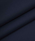 Navy woven fabric folded to highlight structure, density, and surface texture.