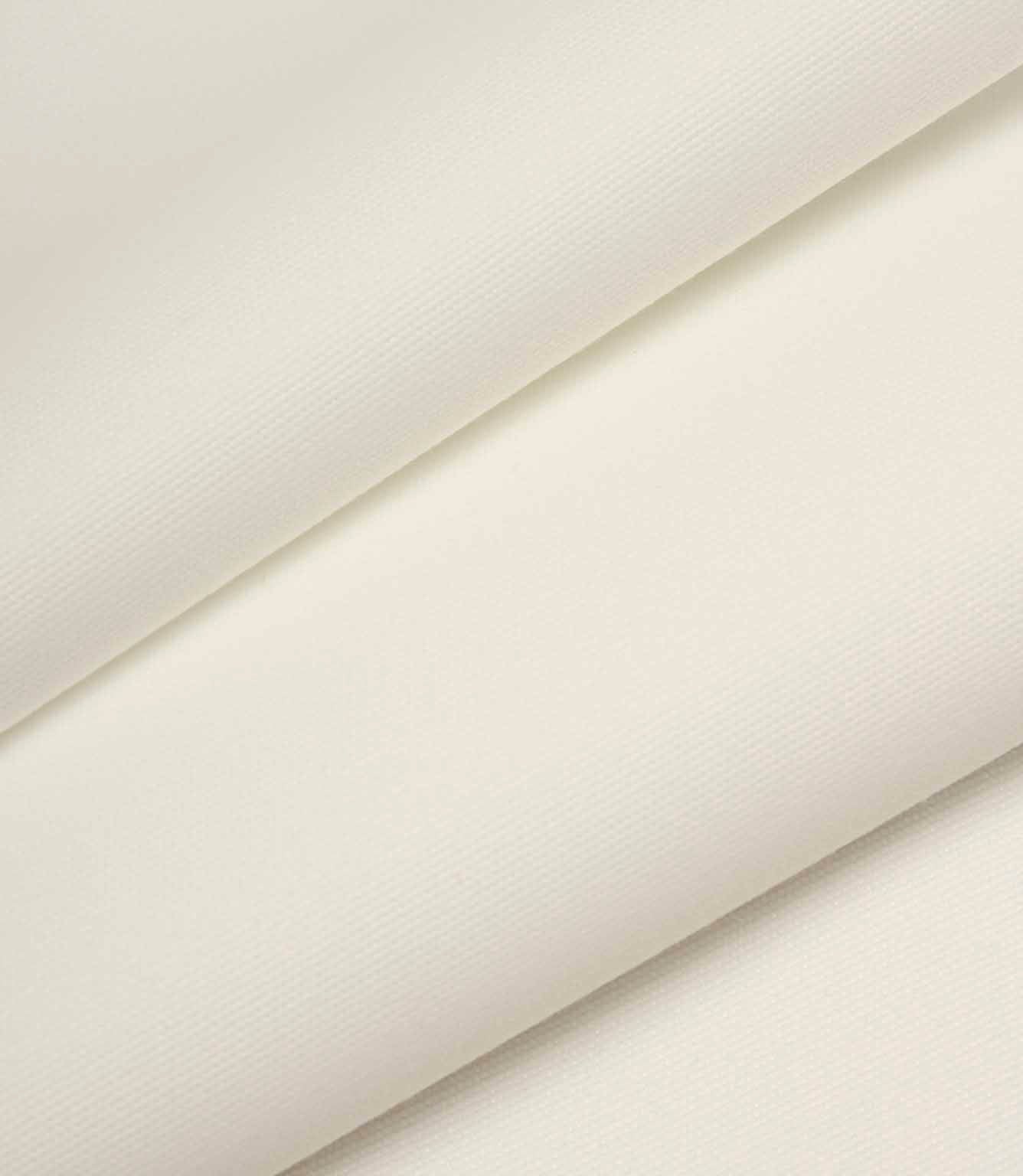 Cream woven fabric folded to show structure, thickness, and clean, uniform finish.